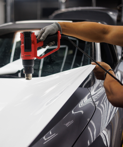 A car being waxed with a machine